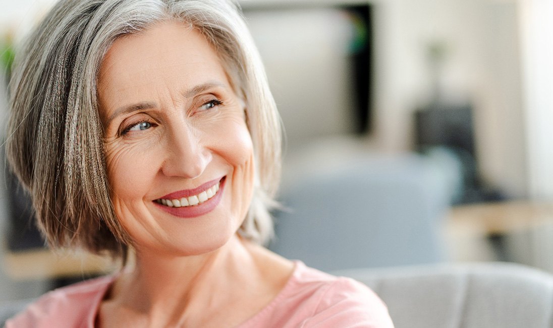 Woman after failed dental implant